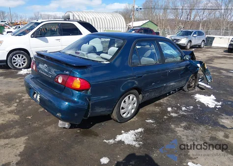 2001 Toyota Corolla Le z USA, uszkodzony, nr VIN 2T1BR12EX1C420630